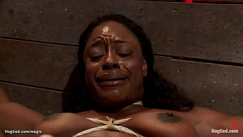 Muscle ebony bodybuilder Kelli Provocateur is bound on her back with legs pinned open and against the wall in a spread eagle position gets pussy vibrated by master Matt Williams on hogtied